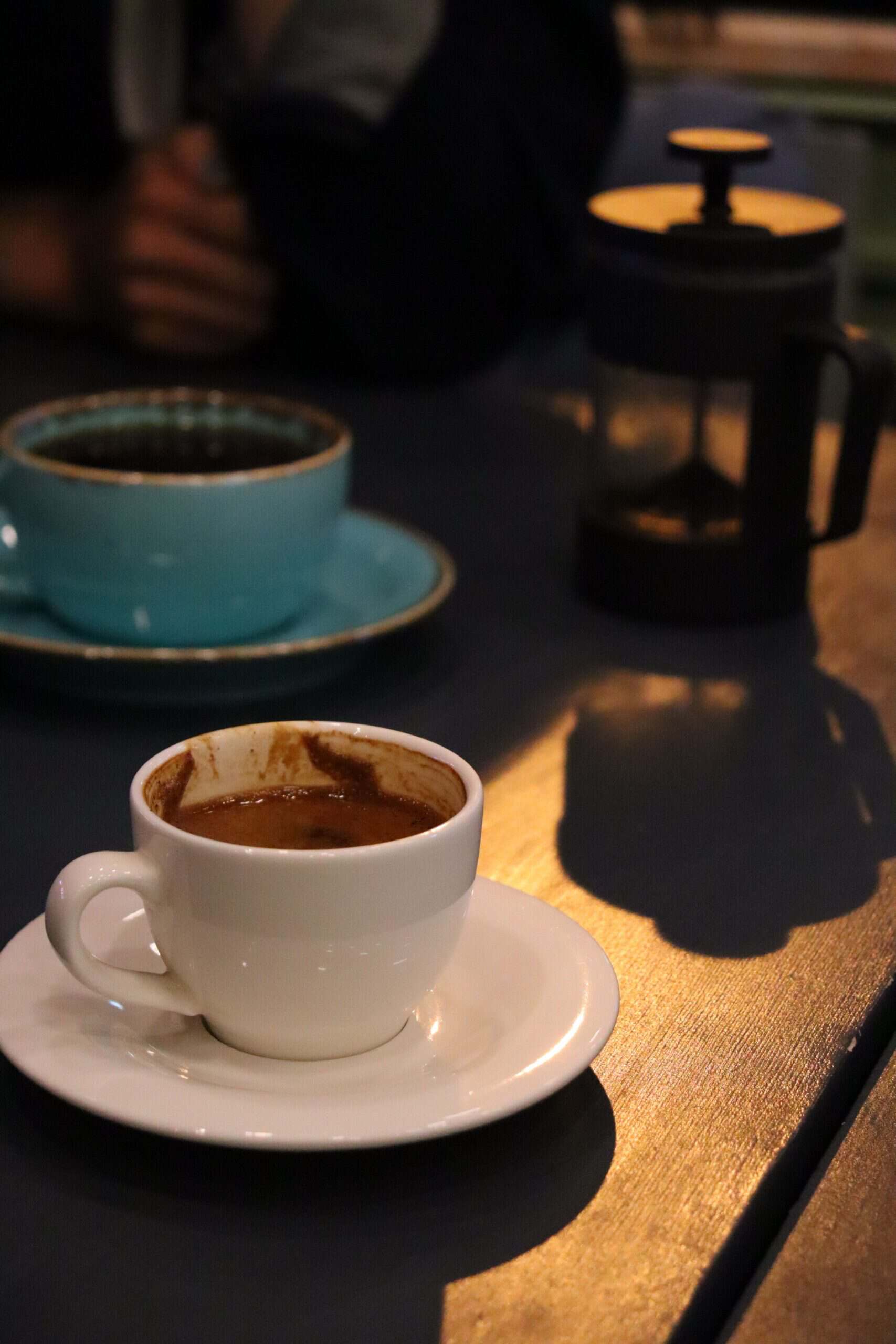 NooCube and coffee visual accompanying the ingredient and stimulant safety discussion